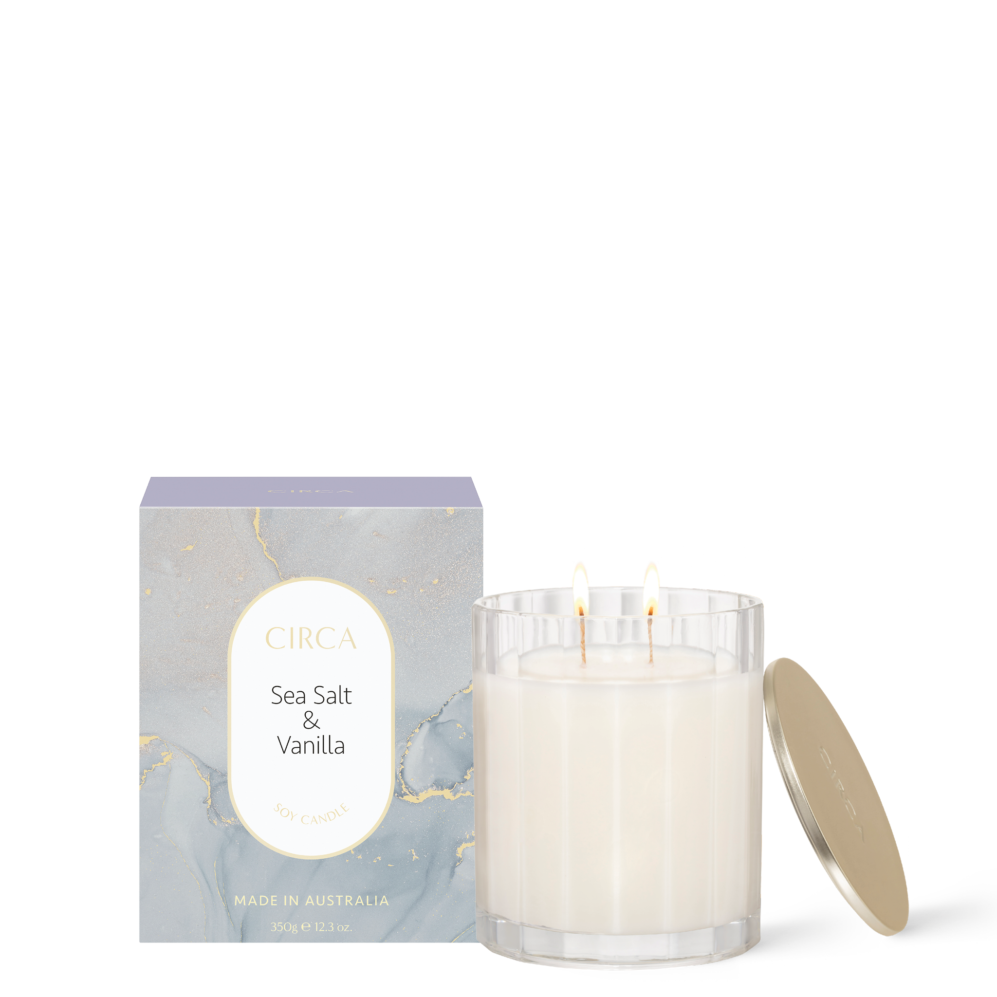 CIRCA Sea Salt and Vanilla 350g Soy Candle burning beside box
