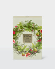 Front-facing 12 Days Advent Calendar with a botanical Christmas wreath design on the closed box.