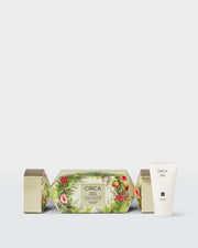 Mango & Papaya 40ml Hand Cream beside front-facing botanical Christmas bonbon packaging.